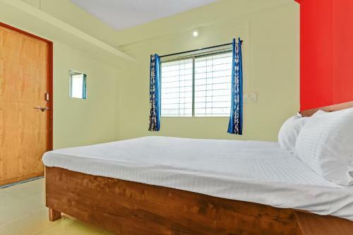 Hotel Spot On 61006 Swarg Lodge