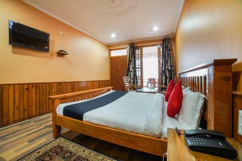 Capital O 47240 Hotel Blossom Resort