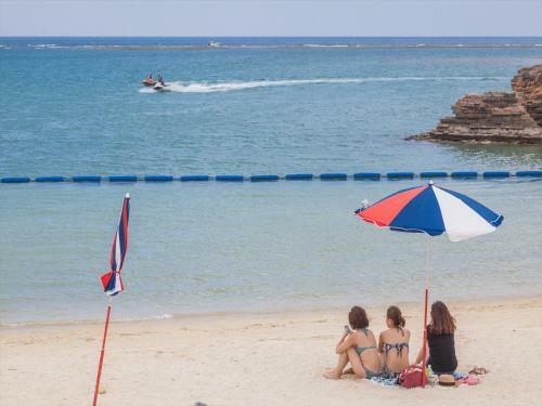 Apartamento Kariyushi Condominium Resort Chatan Route58