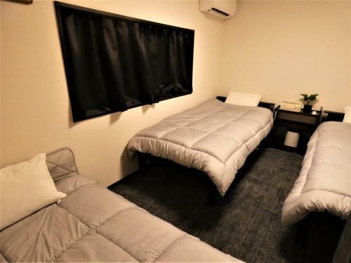Hostal Guest House Suzumeno Kakurembo
