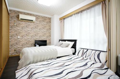Apartamento Naha Central Inn