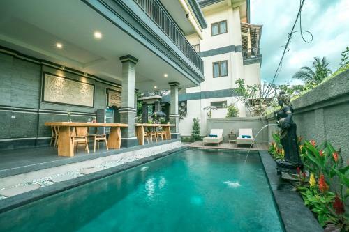 Hostal Three Dewi's Guest House