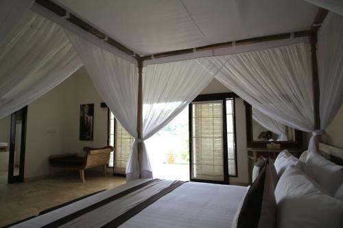Hostal Frangipani Villas
