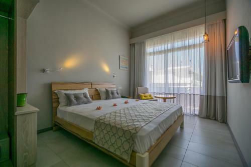 Hotel Le Peninsula Bay Beach Resort & Spa