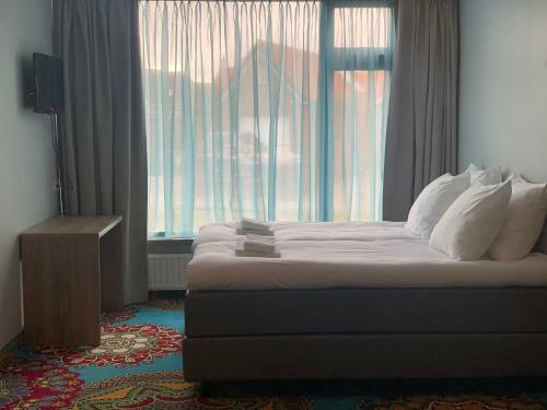 Opium Hotel En Restaurant