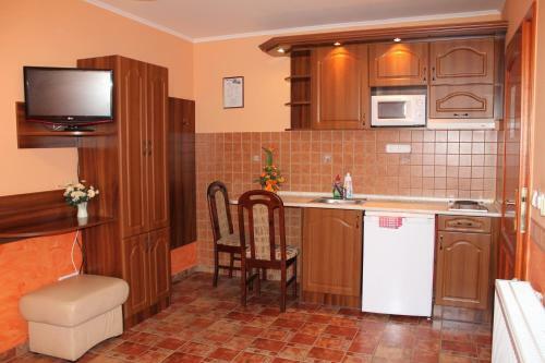 Rozmann Family Panzi� & Apartmanhaz