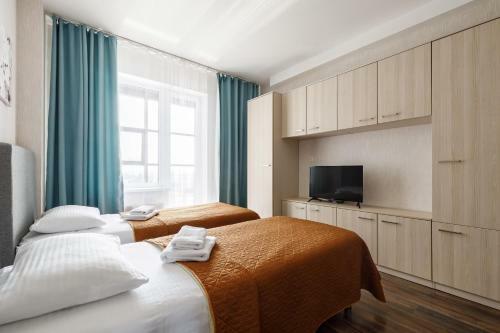 Salut Plus Apartments