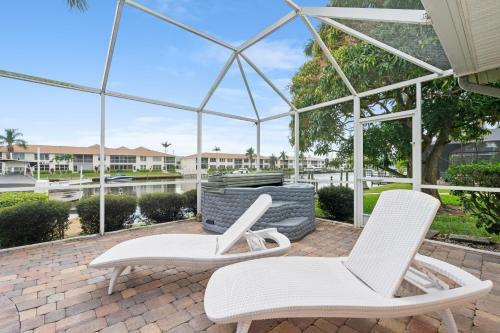 Canal-side ?sky Palms Villa? - Dock, Pool & Hot Tub Home