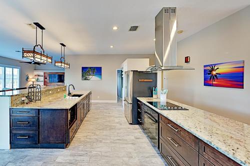 Lavish Canal-front Getaway With Heated Pool & Dock Home