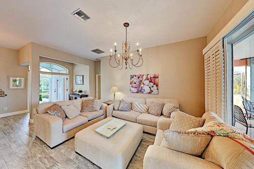 Lavish Canal-front Getaway With Heated Pool & Dock Home