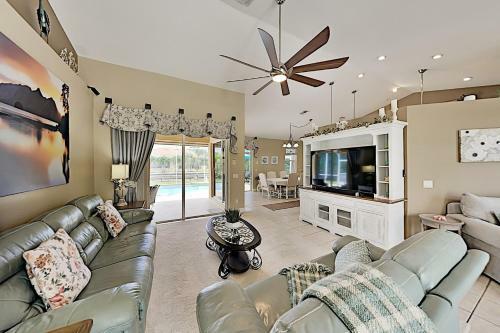 Canalfront Beauty With Private Heated Pool & Garage Home
