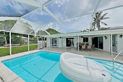 Canal-front Getaway With Heated Pool & Dock Home