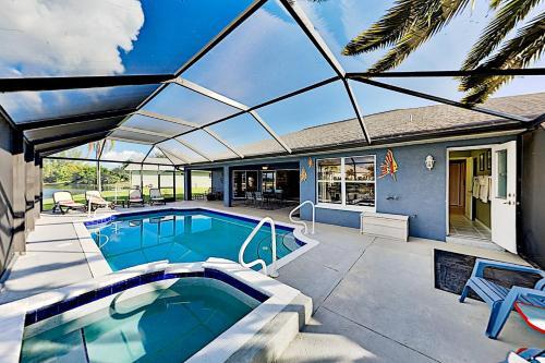 Waterfront Oasis - Private Caged Pool, Spa & Dock Home