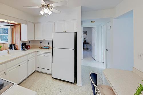 New Listing! Canal-front Escape With Private Yard Home
