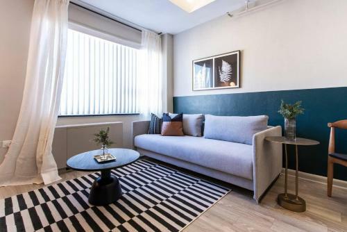 Apartamento Abode Vue At 3rd 1-bedroom Loft-style Suite