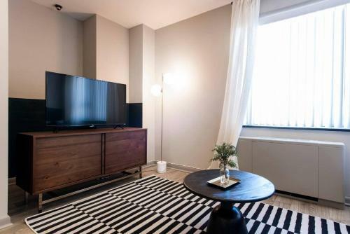 Apartamento Abode Vue At 3rd 1-bedroom Loft-style Suite