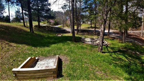 Free Xplorie Attractions Every Day! - Driftwood Log Cabin