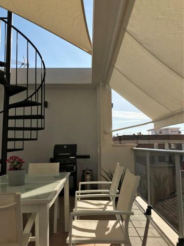 Rooftop Apartment With Three Terraces
