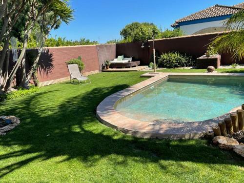 Two-bed Villa With Tropical Garden In Chiclana