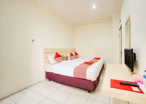 Oyo 2554 Hotel Arimbi Lama Dewi Sartika