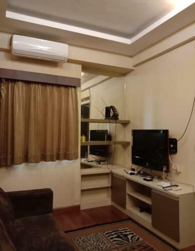 The Suites Metro Apartment By Nfo Property