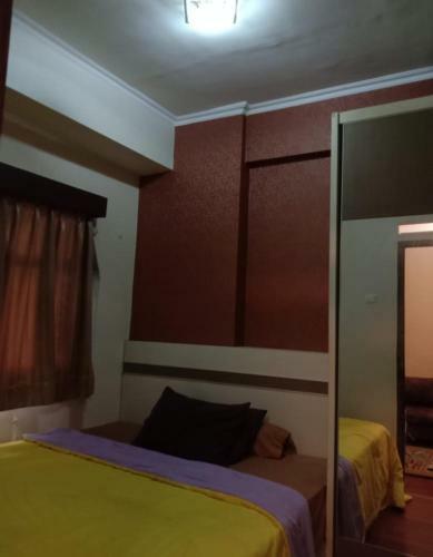 The Suites Metro Apartment By Nfo Property