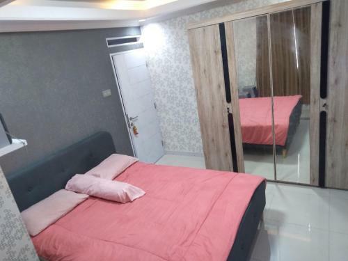 Emerald Tower Apartemen By Arra