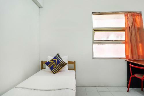 Hotel Spot On 90894 Icarus Home Syariah