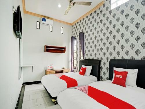 Hotel Oyo 90396 The Halona Villa Batu