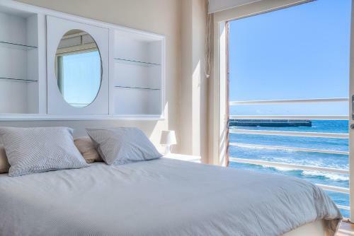 House Touching The Sea