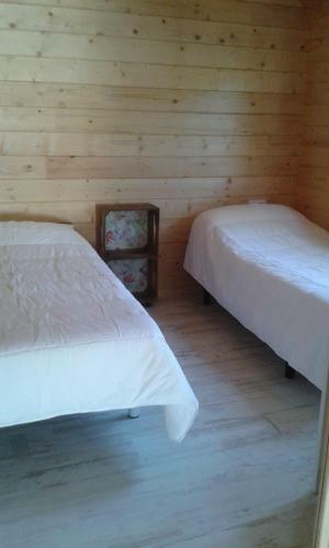 Casita de Madera Junto Al Mar