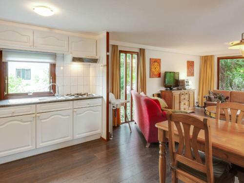 Beautiful Chalet With Swimming Pool In Stegeren