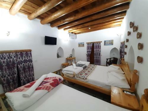Hotel Madrasah Polvon-qori Boutique