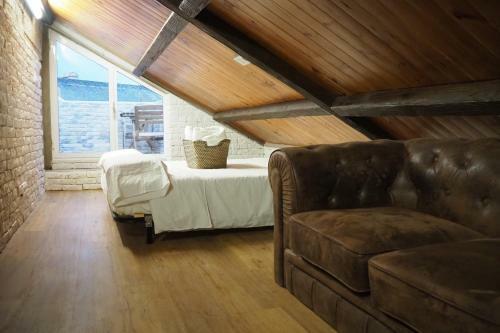 Tiny And Cute Apartment In The Roof Touching Border