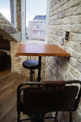 Tiny And Cute Apartment In The Roof Touching Border