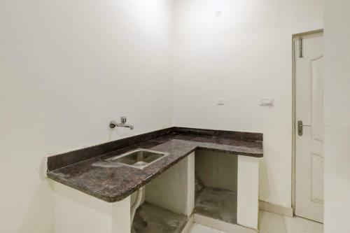 Hostal Oyo 79887 The Purple Orchid Stay