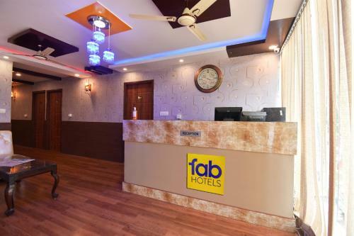 Fabhotel Dhanvitha Suites