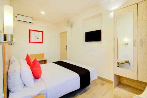 Capital O 77459 Smile Hotels