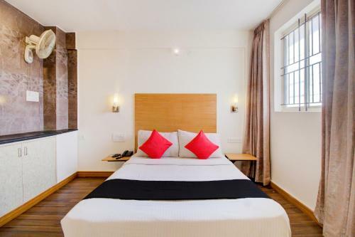 Capital O 77459 Smile Hotels