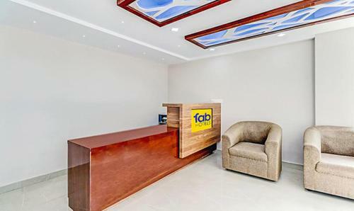 Fabhotel Emora Suites