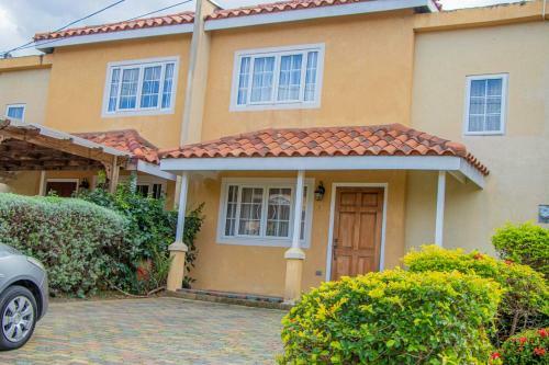 Hostal Holidays At Mango Walk Country Club