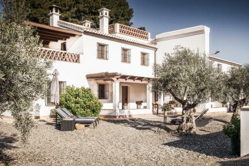 Casa Grande / Rosas Cantares