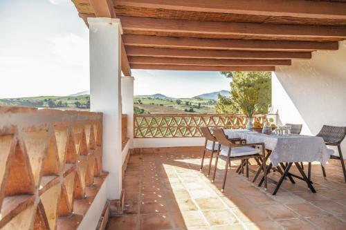 Casa Grande / Rosas Cantares