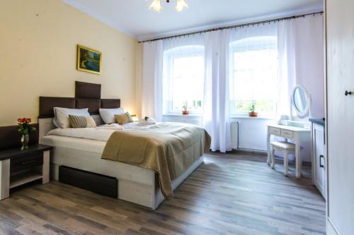 Apartamenty Izerskie - Ul. Wczasowa 8