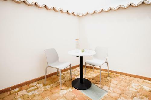 Hotel Unic - Turisme D'interior