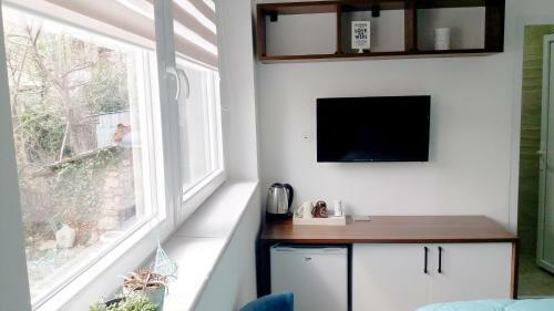 Hostal The House Apartments & Guest Rooms