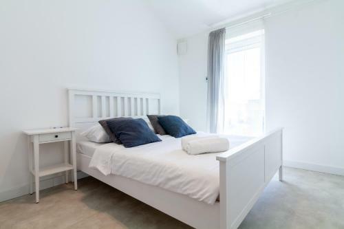 White Sand Apartment With A Balcony, By Cohost