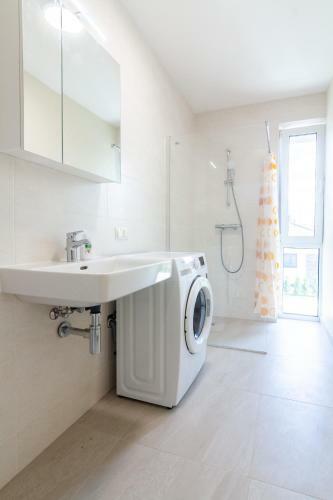 White Sand Apartment With A Balcony, By Cohost