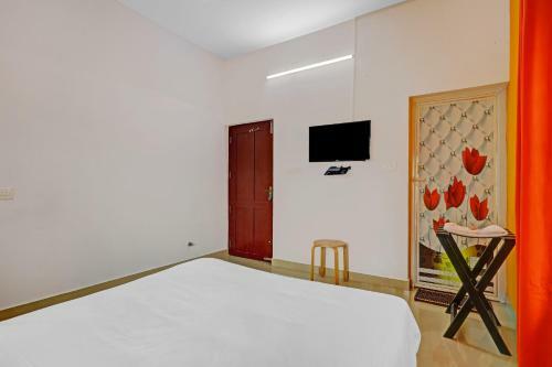 Hotel Capital O 84184 Pop Tavern Kazhakkottam