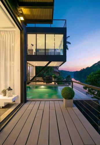 Ultramodern Riverfront Villa With Infinity Pool